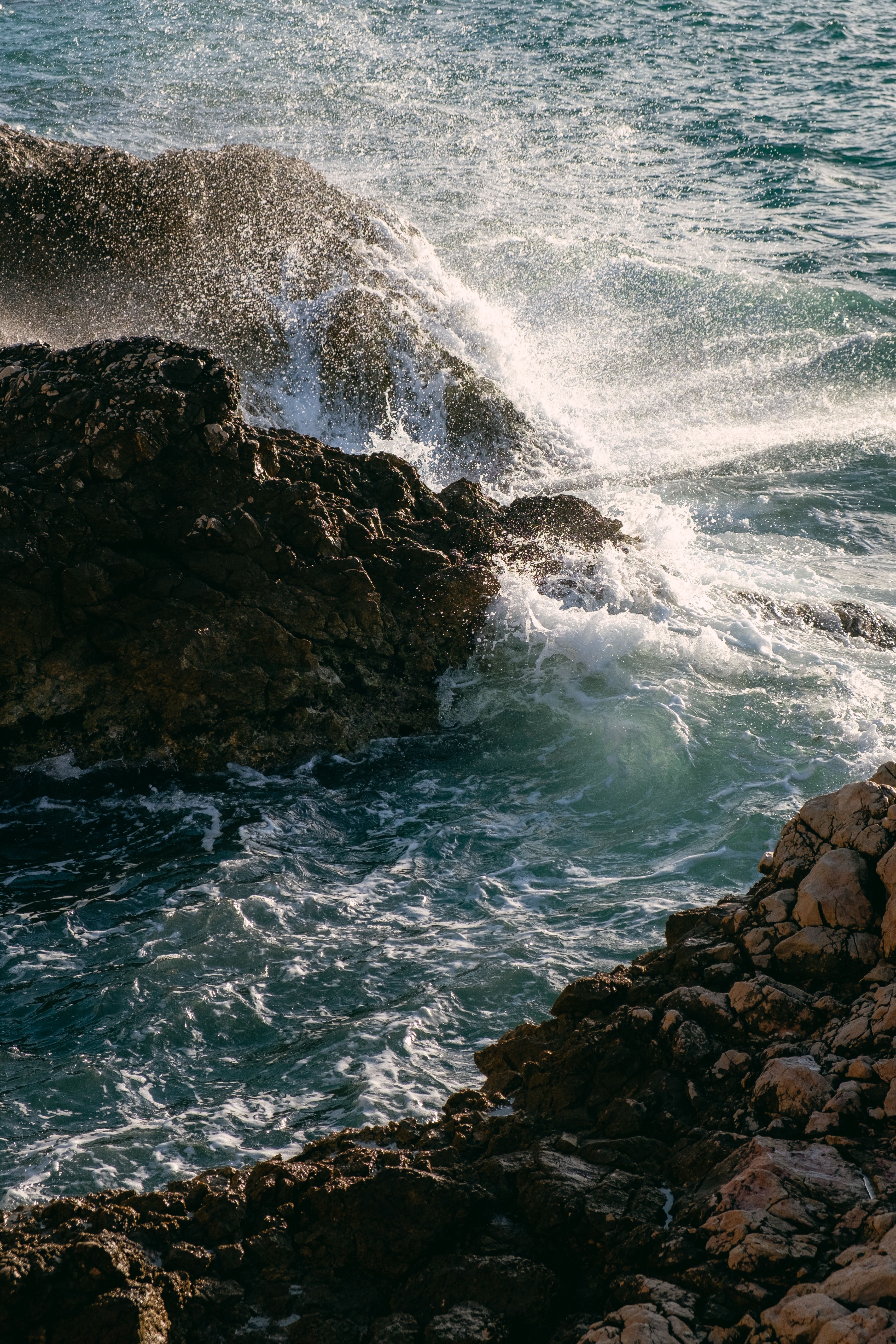 View of a Sea and Rocks · Free Stock Photo