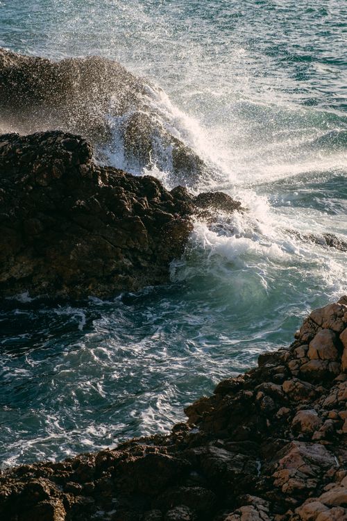 See With Rocks View of a Sea and Rocks · Free Stock Photo