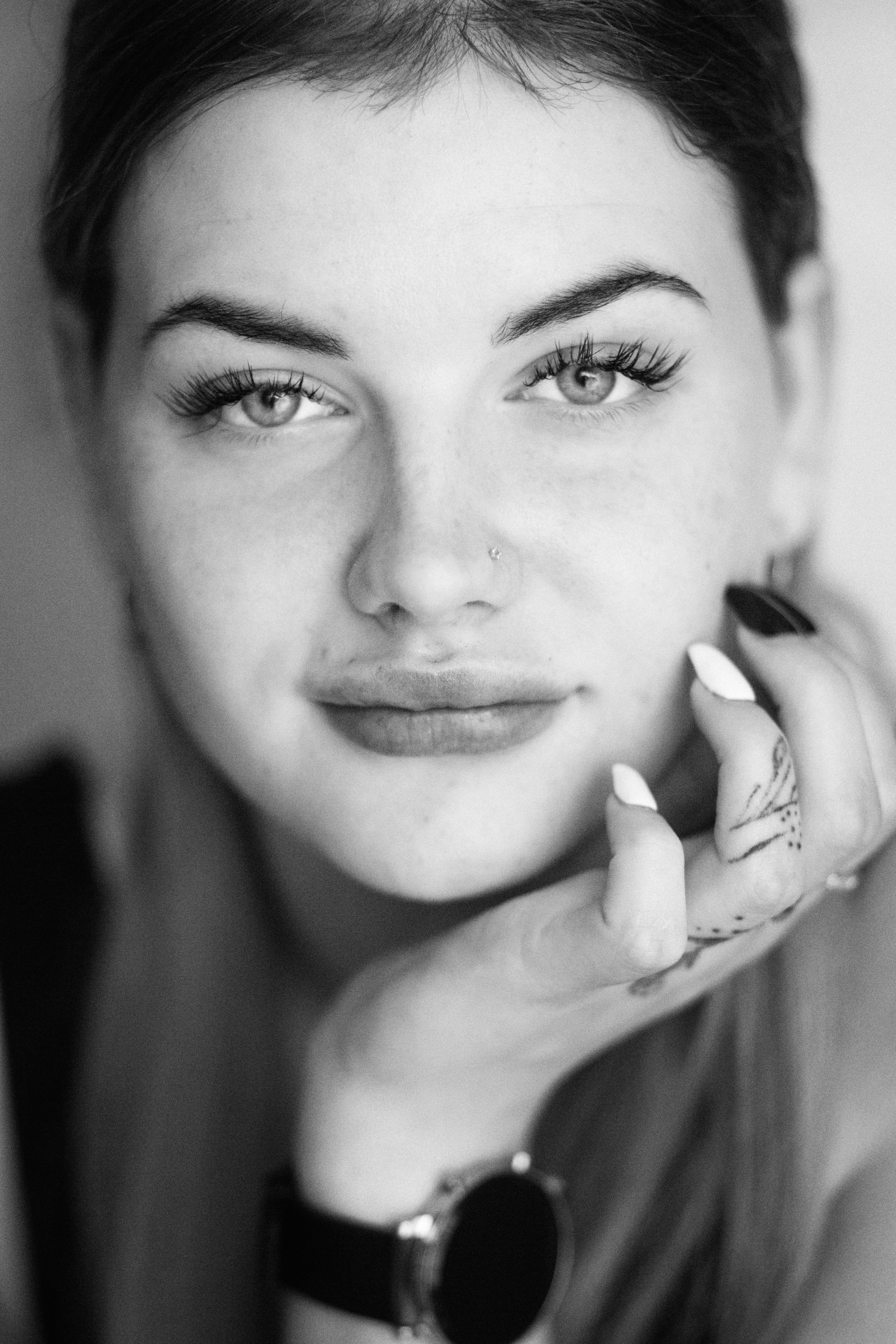 A woman with a tattoo on her hand · Free Stock Photo
