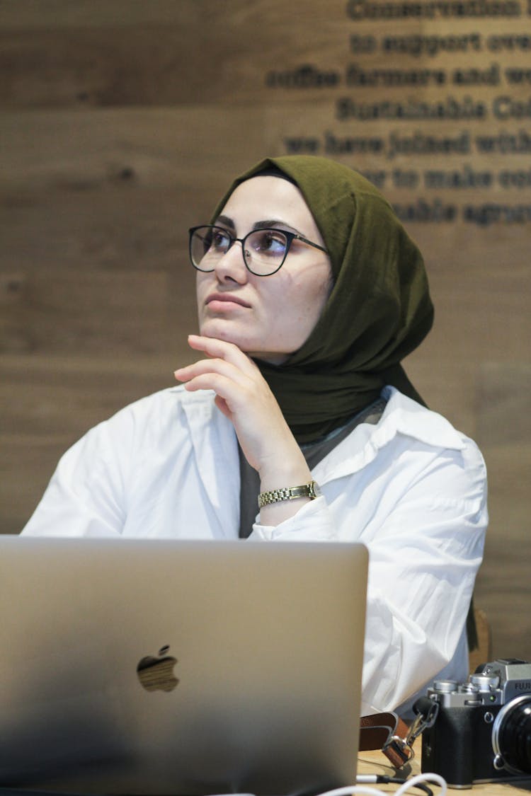 Woman Sitting At The Computer