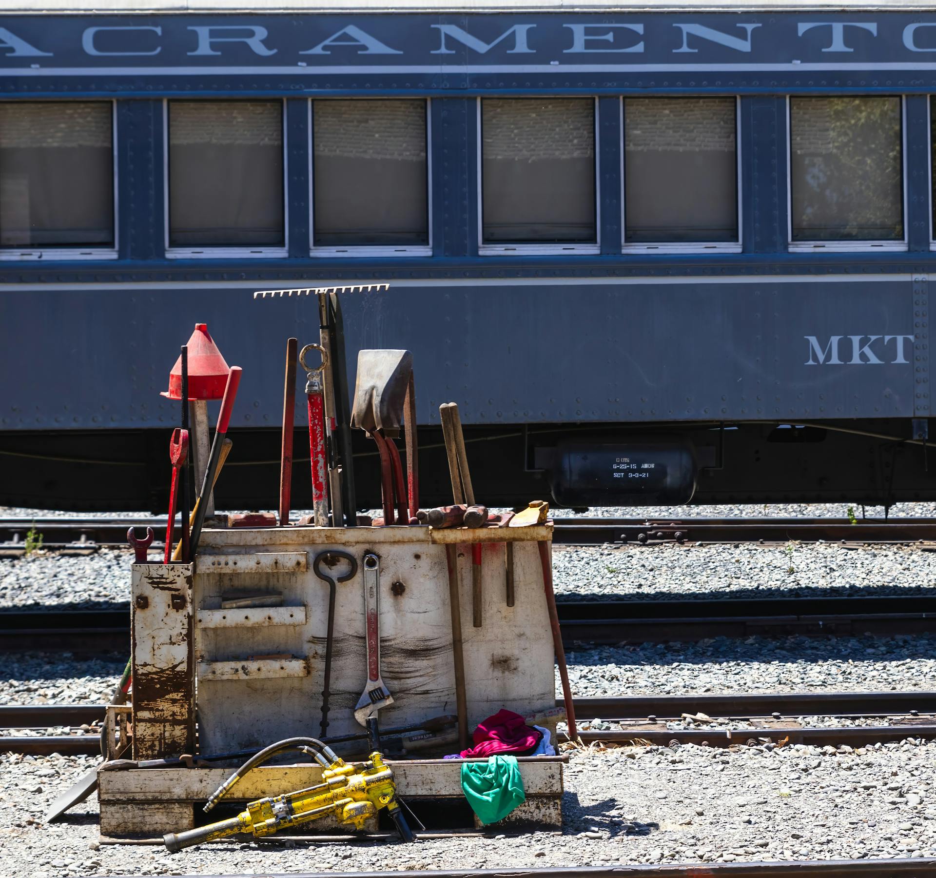 Repairing Tools near Railroad and Locomotive