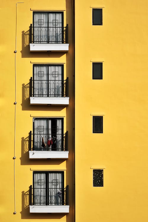 Gratis stockfoto met appartement, appartementen, balkons