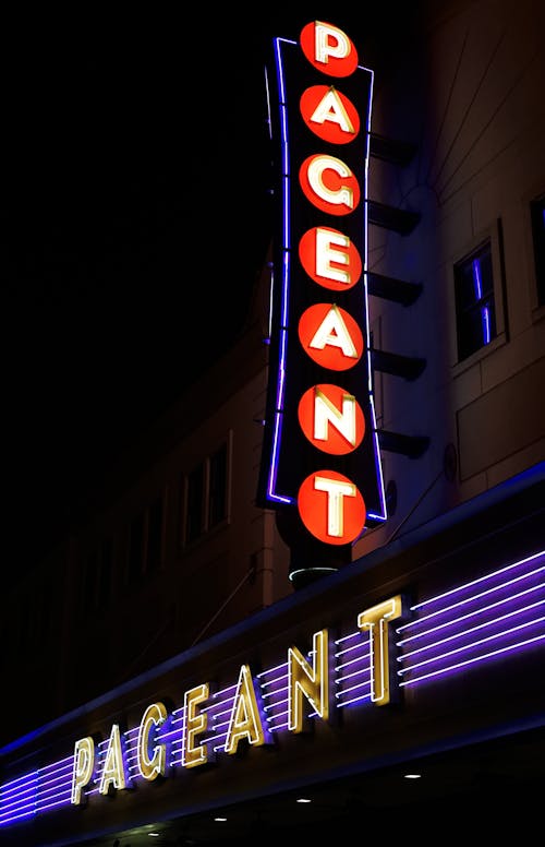Neon Lights of a Cinema at Night