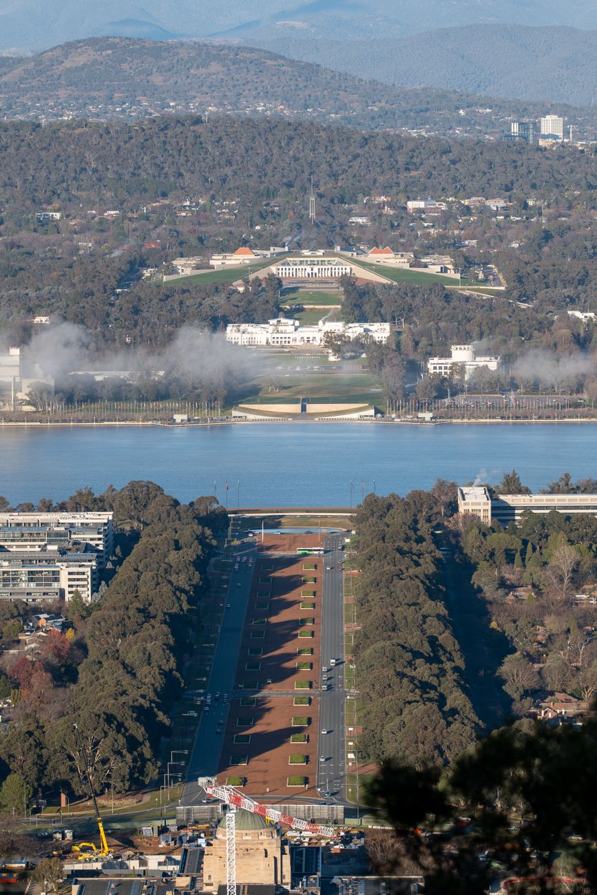 Aerial view of Canberra with Parliament House and surrounding parkland