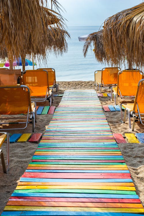 Colorful Path Leading Between Rows of Chairs