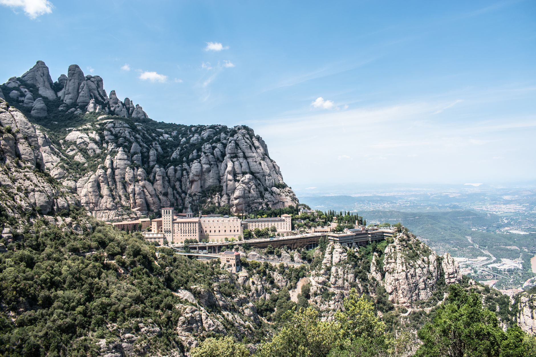 Explore Montserrat Monastery nestled in the rugged mountains of Catalonia, Spain.