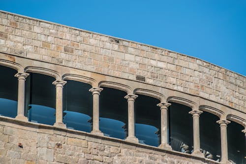 Windows behind Colonnade on Building Wall