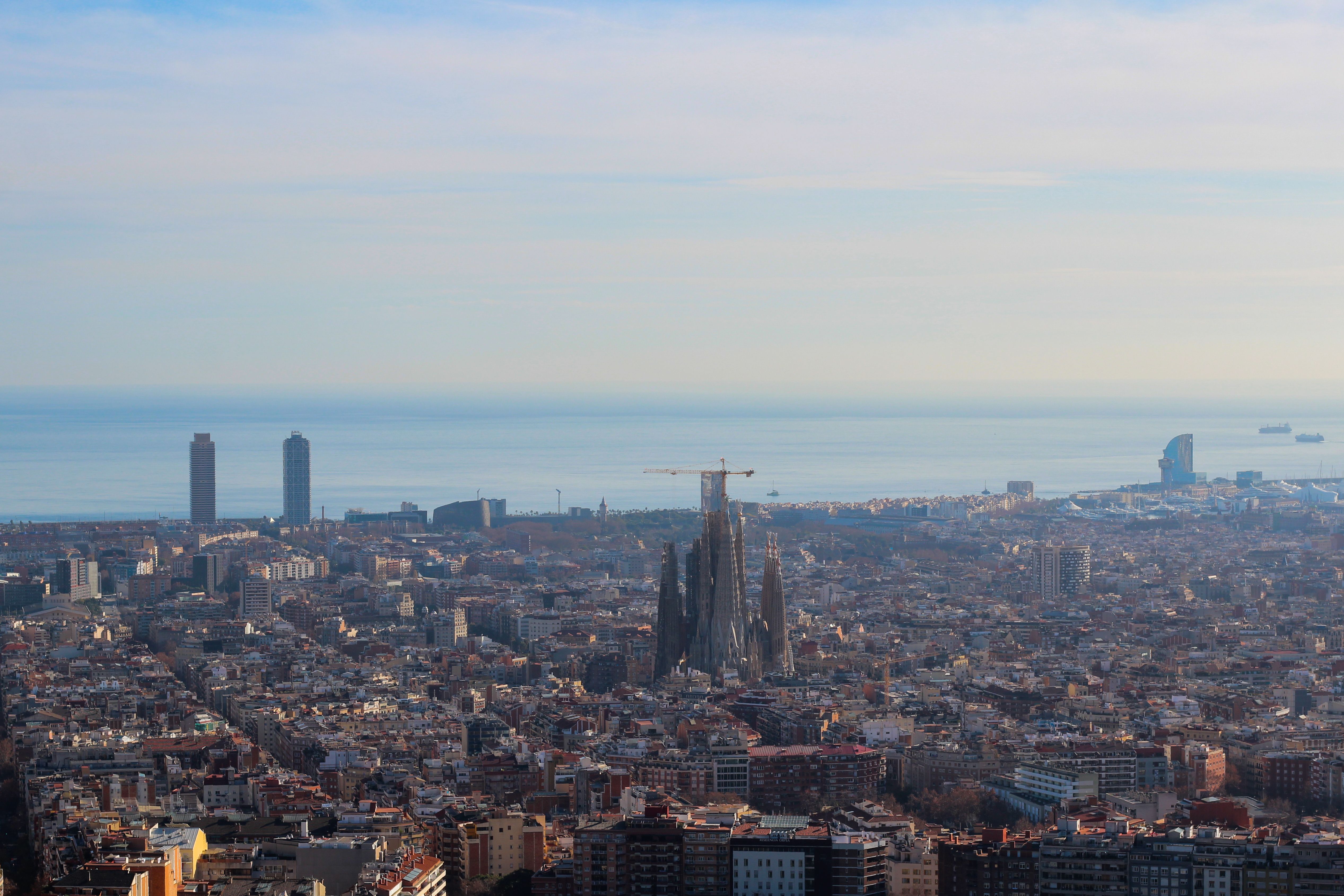 Barcelona skyline with Sagrada Familia visible in the cityscape.