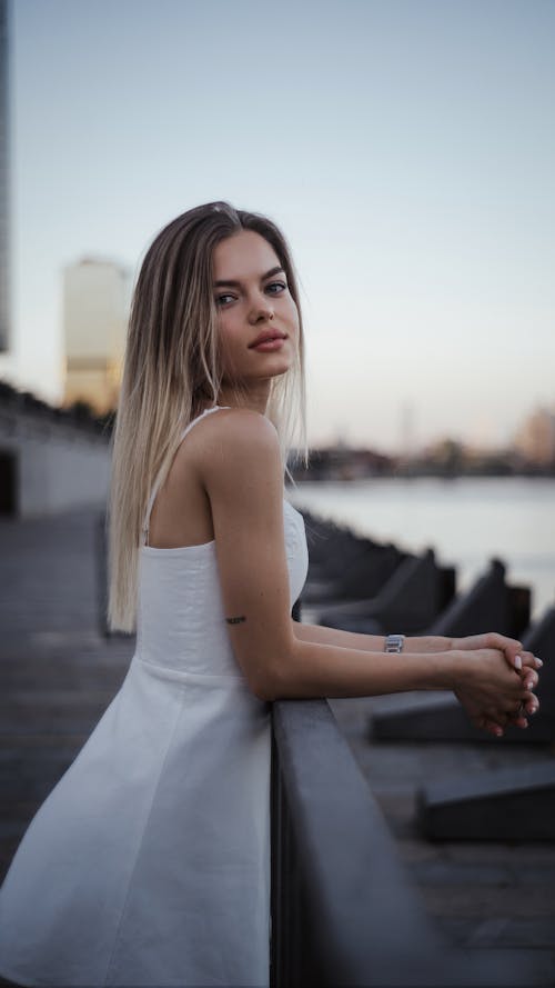 Blonde Woman in White Dress