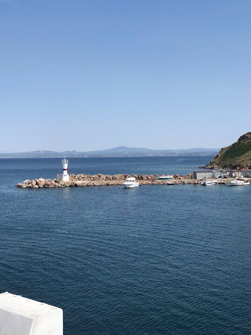Panorama of a Sea Bay with Lighthouse