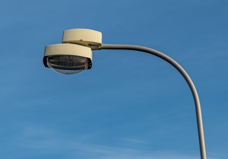 Modern Streetlamp On An Arched Metal Pole