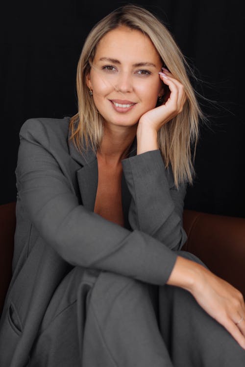 Studio Shot of a Young Woman in a Suit 