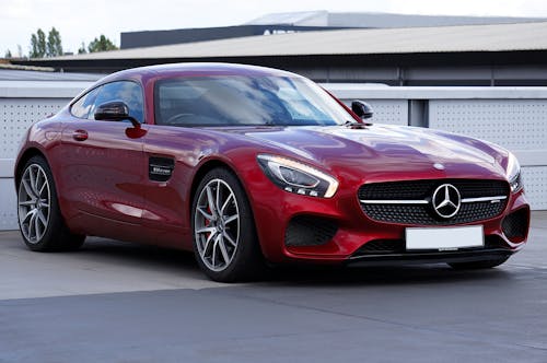 A Red Mercedes-Benz GT S on a Parking Lot