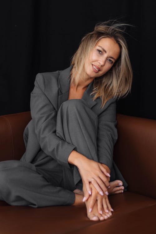 Studio Shot of a Young Woman in a Suit 