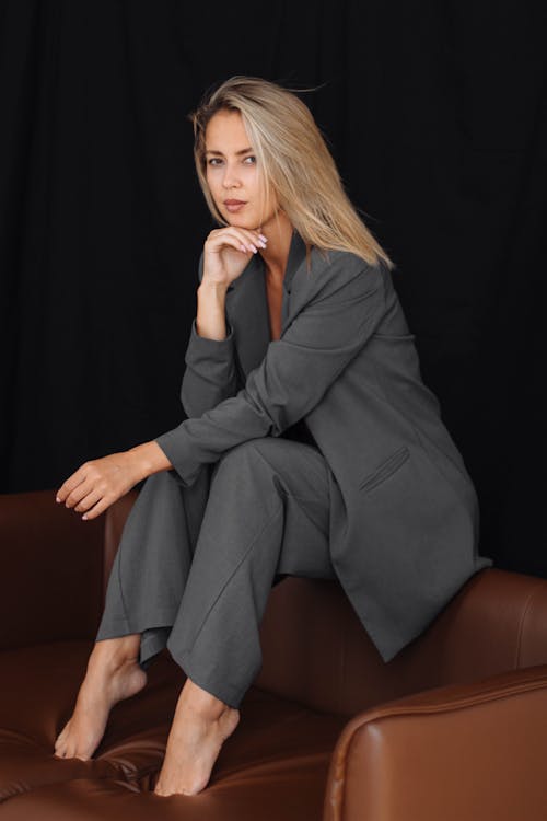 Studio Shot of a Young Woman in a Suit 