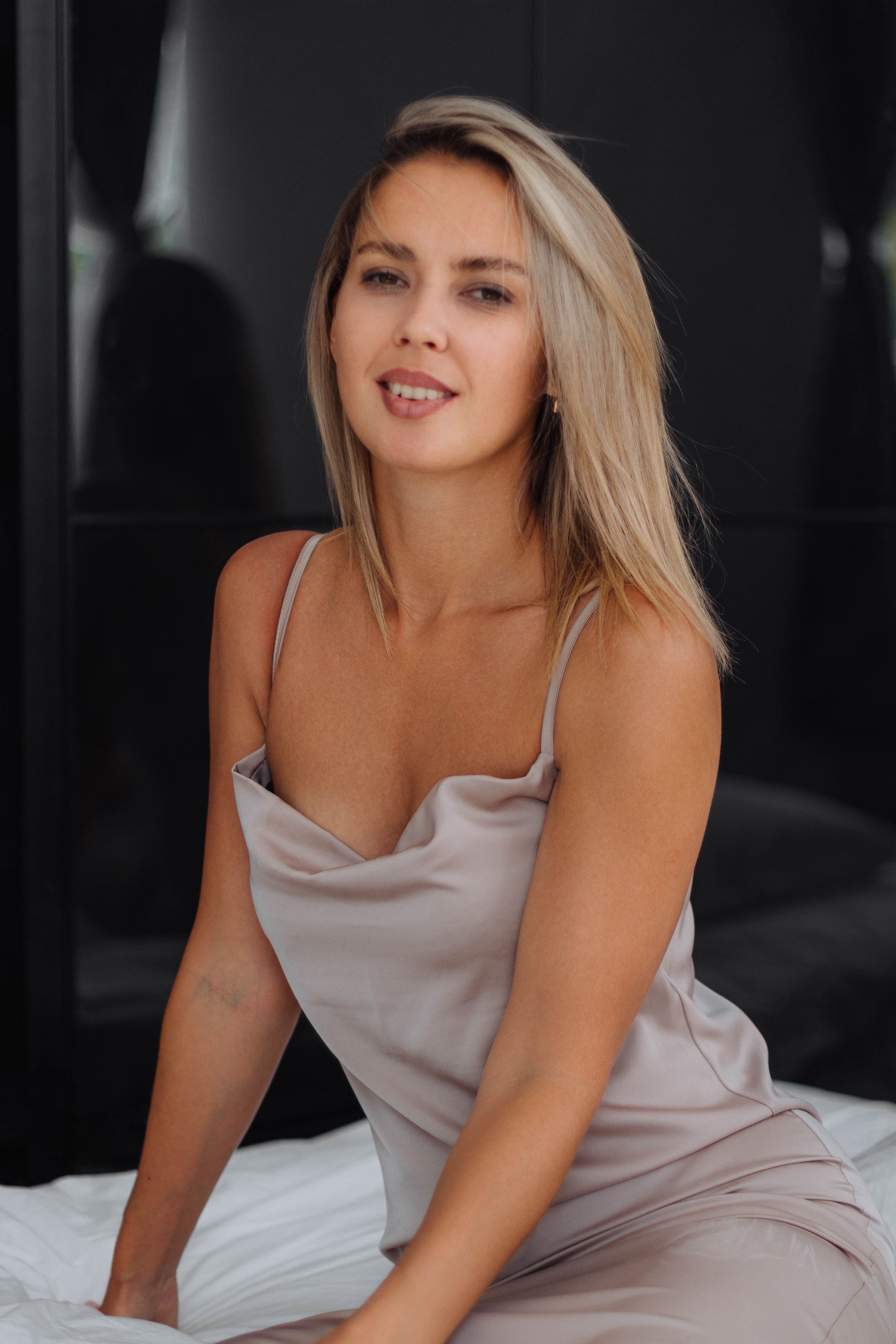Blonde Woman in Purple Dress  Free Stock Photo