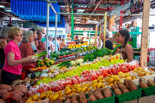 People Buying Vegetables at Bazaar
