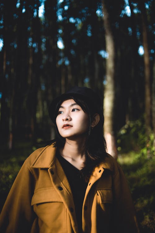 Young Woman in Green Forest