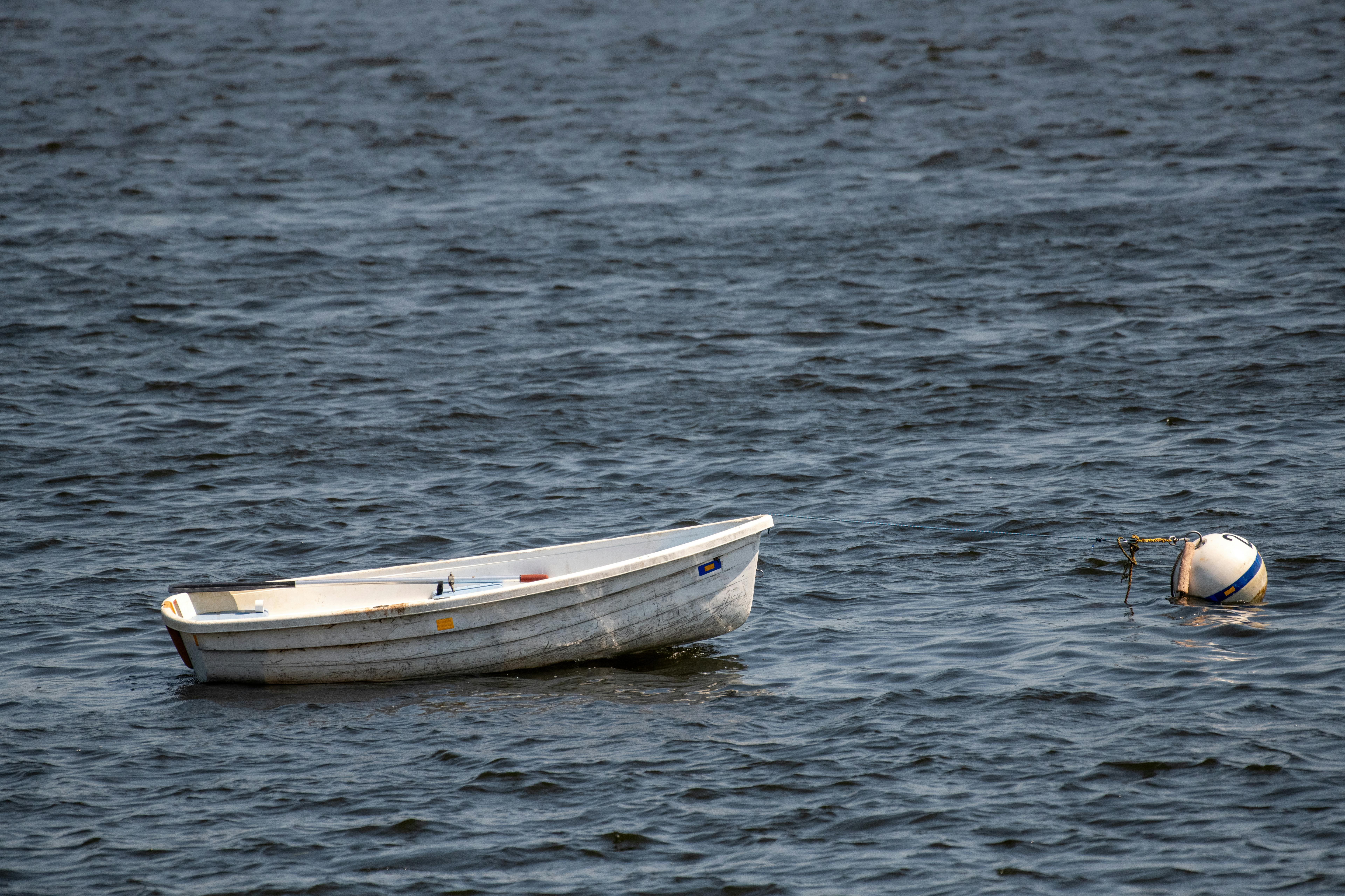 Small Wooden Boat On The Calm Lake Stock Photo, Picture and