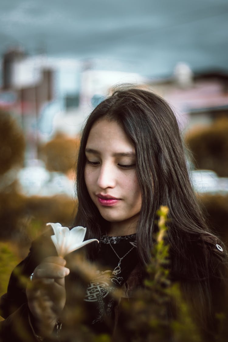 Teenage Girl With Flower