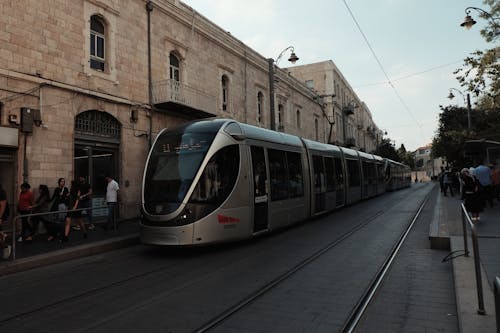A Modern Tram on the Street in City 