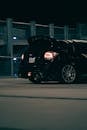 A Black Subaru WRX on the Parking Lot at Night