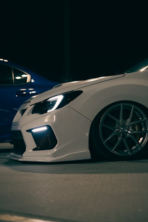 A Modified Subaru WRX on the Parking Lot at Night 