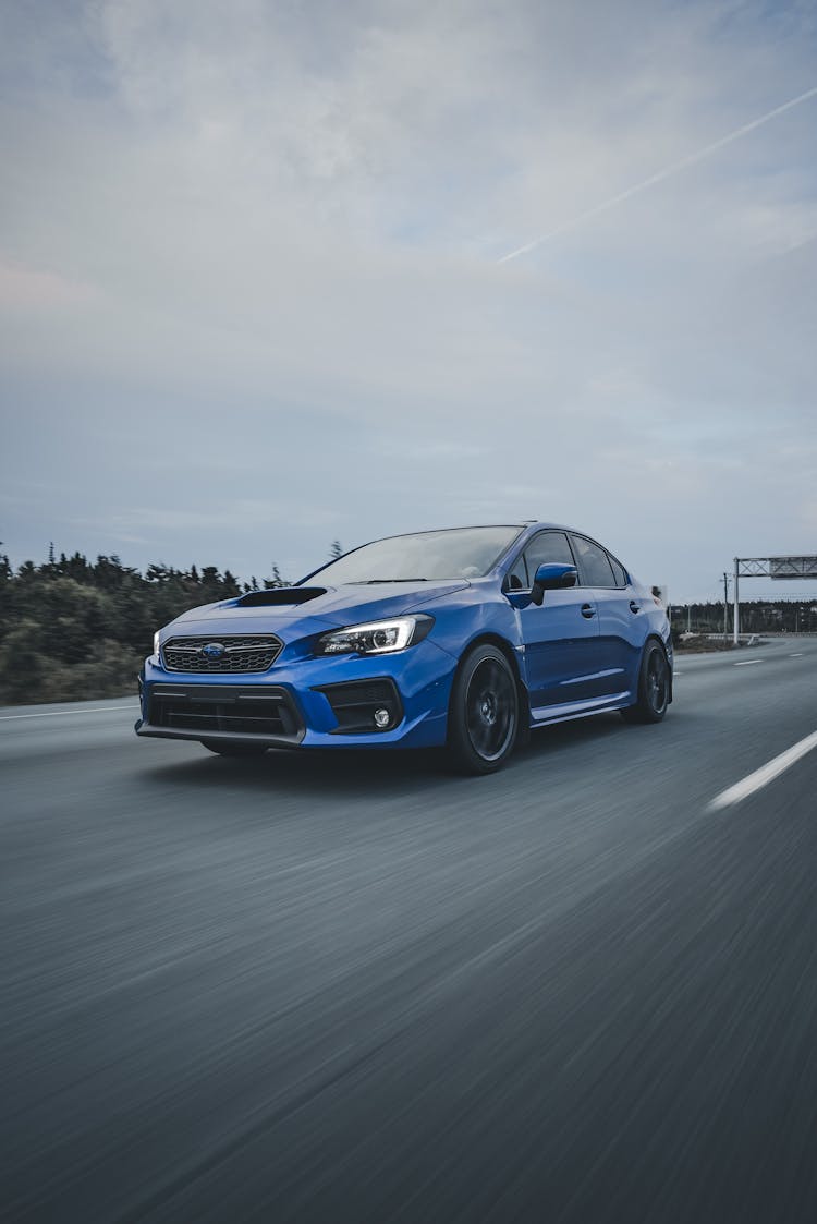 A Subaru WRX Driving On The Street 