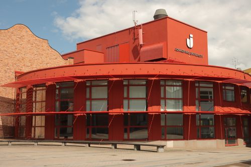 Free Explore the striking modern design of Jönköping University in Sweden with its vibrant red facade. Stock Photo