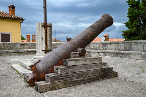 Free Rusty cannon exhibit in Labin's historic area, Istarska županija, Croatia. Stock Photo
