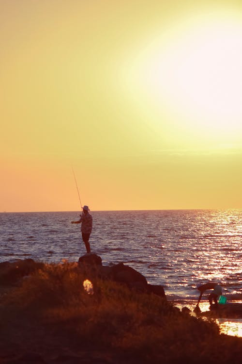 Kostenloses Stock Foto zu angeln, angler, blaues meer