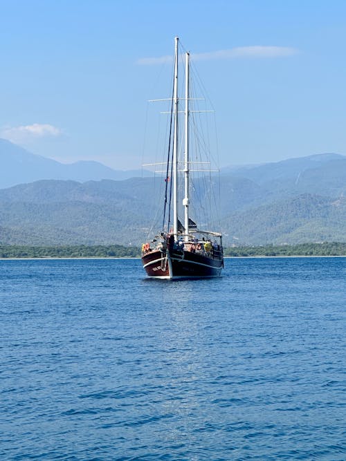 View of a Large Sailboat on the Sea 