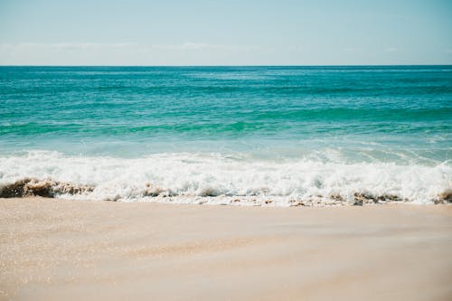 Foto profissional grátis de areia, borrifando, costa