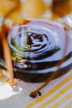 Close-up image capturing ripples in a glass coffee maker with Chemex. Perfect for coffee enthusiasts.