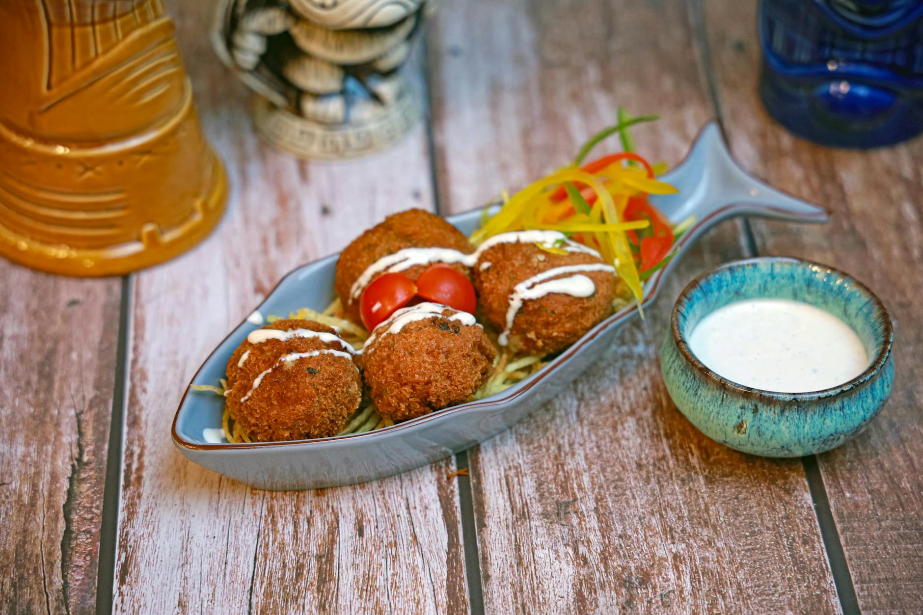 Golden Crab Hush Puppies frying in oil