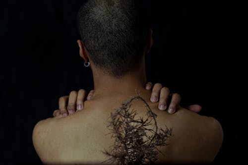 Woman With Plant on Back