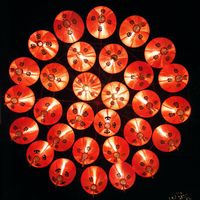 Cluster of glowing red paper lanterns at night. Photo by JK on Pexels
