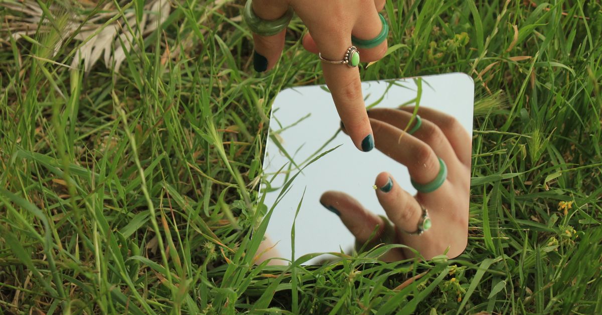 Hand Reflecting In Mirror Free Stock Photo hand-reflecting-in-mirror-free-stock-photo