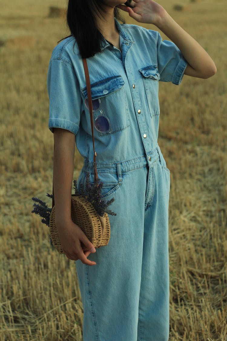 Close Up Of Woman In Jean Jacket And Jeans