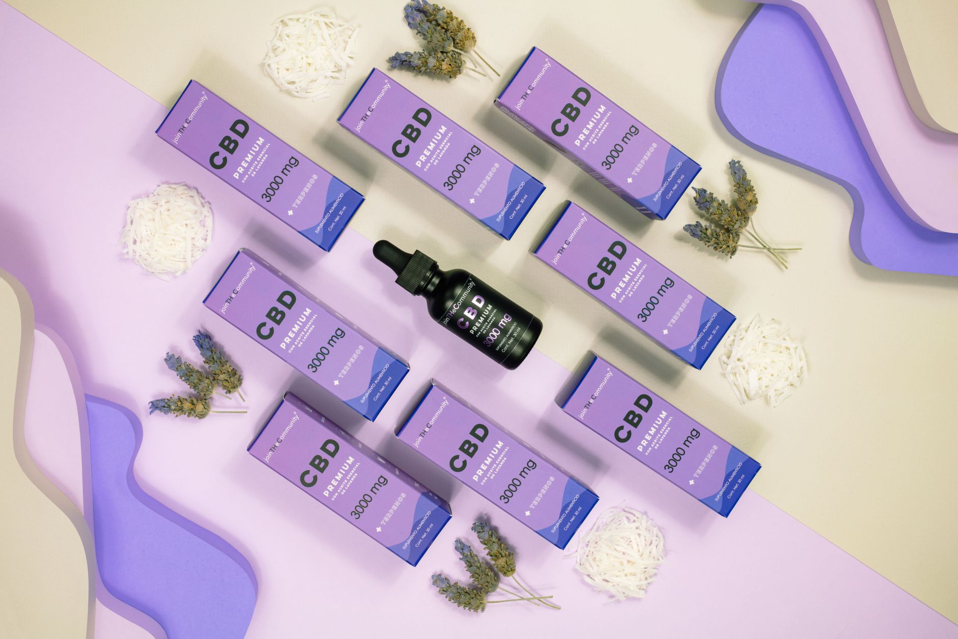 Top view of CBD product packaging with lavender and abstract purple tones, perfect for wellness concepts.