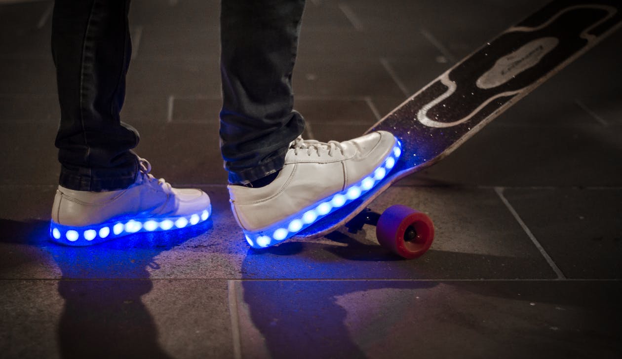 White Sneaker With Led Light on Black and White Long Board