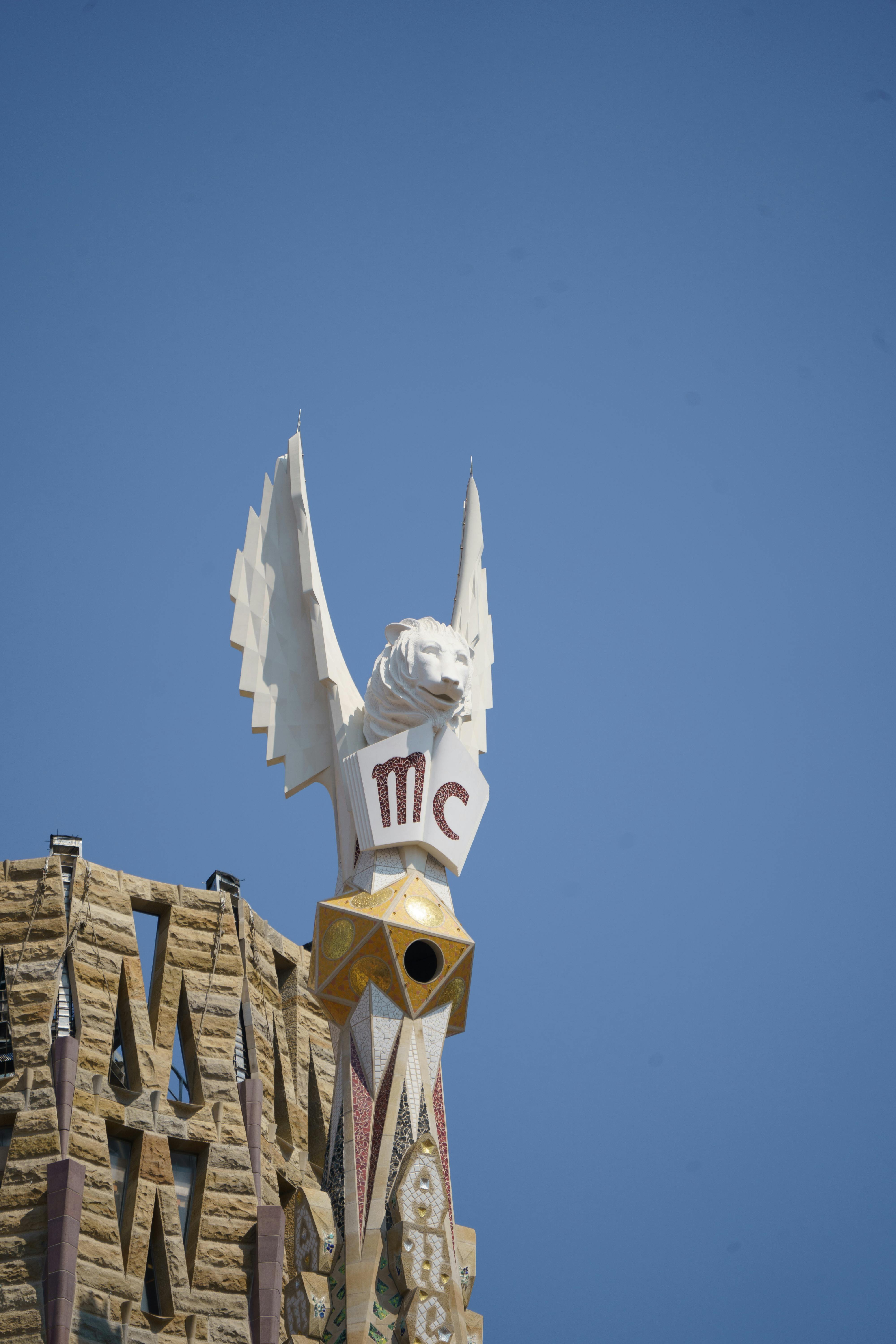 winged lion sculpture at la sagrada familia cathedral barcelona spain