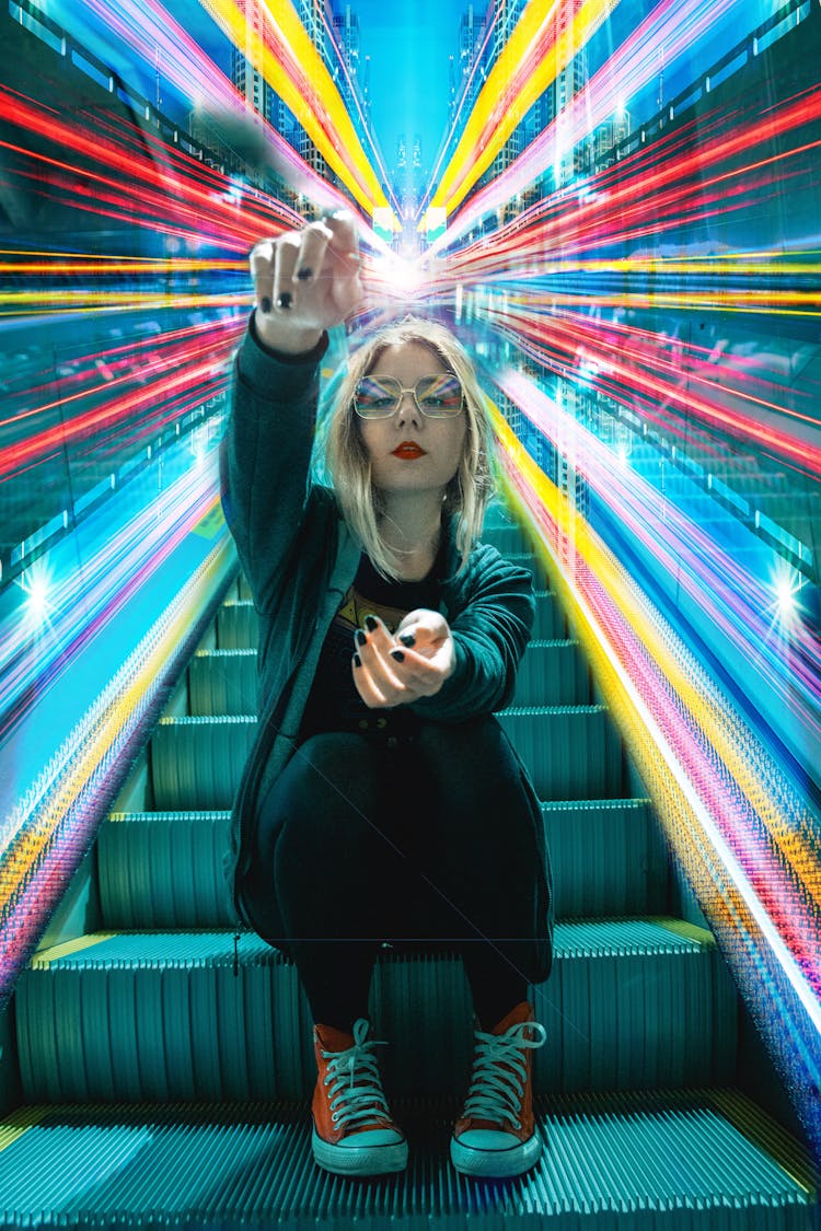 Woman Sitting On Escalator