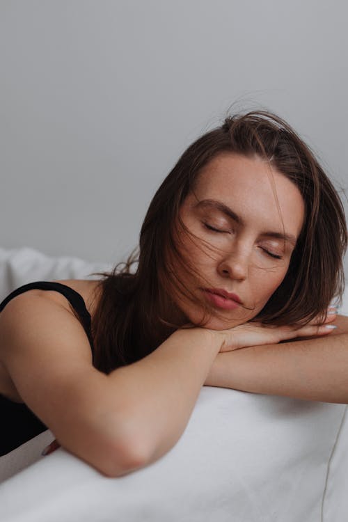 Portrait of a Woman Sitting with her Eyes Closed