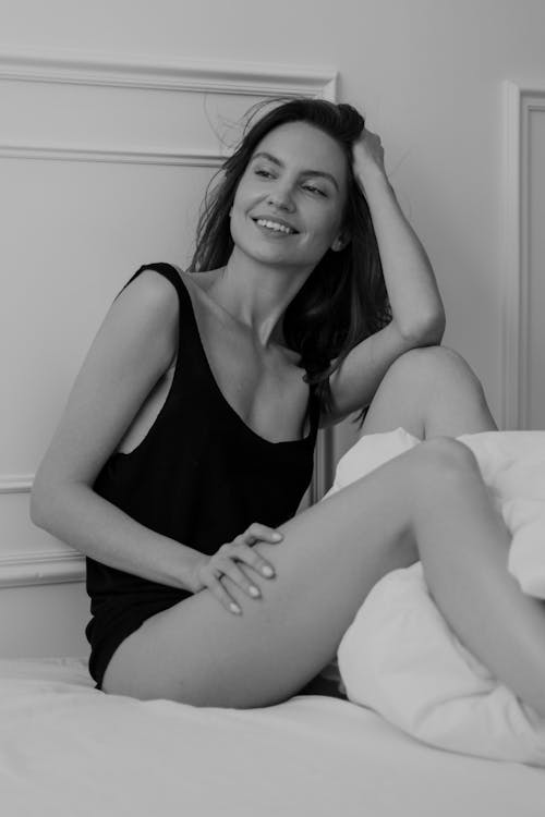 A Smiling Woman in a Black Lingerie