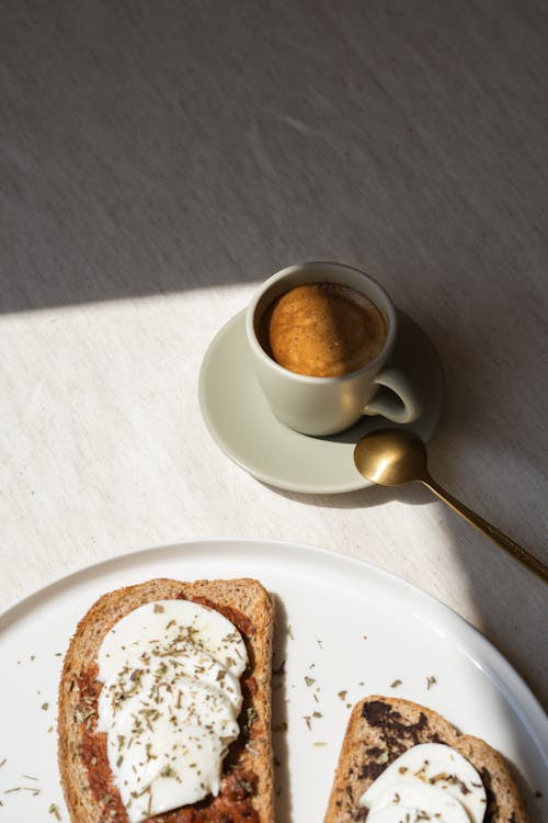 Free Coffee Cup Near Bread with Cheese on Plate Stock Photo