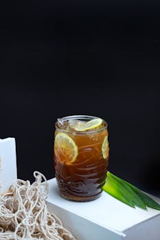 Chilled lemon iced tea with pineapple, perfect for a refreshing summer drink.