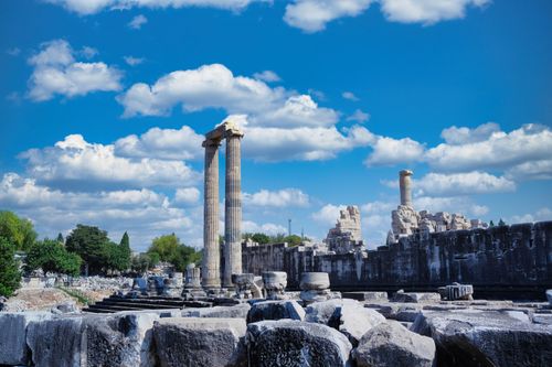 Free Explore the ancient ruins of the Temple of Apollo in Aydın, Türkiye against a vivid blue sky. Stock Photo
