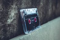 Black and Gray Cassette Tape Leaned on Wall