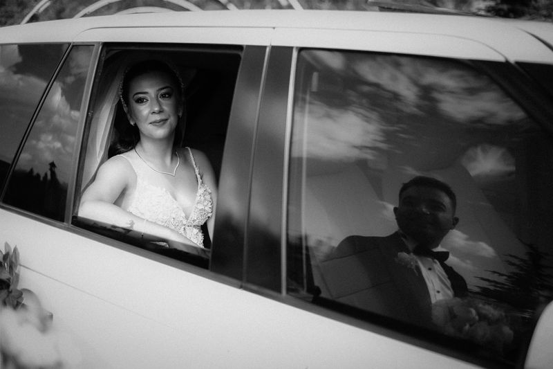 Wedding Limo Bride and groom captured in limousine during wedding day Toronto